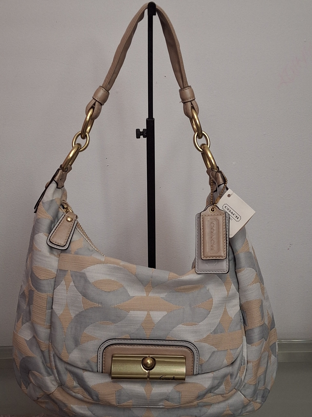 Coach Kristin shoulder bag features the signature Op Art pattern
